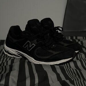 Men’s New Balance 2002R Black Sneakers – Size 9